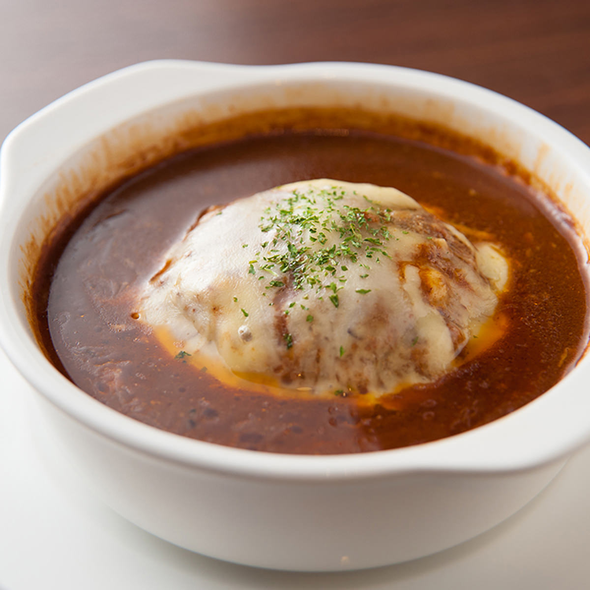 大阪 洋食Revo 名物黒バーグR煮込み 4個 〔200g×4〕 ハンバーグ【北海道・沖縄・離島 お届け不可】